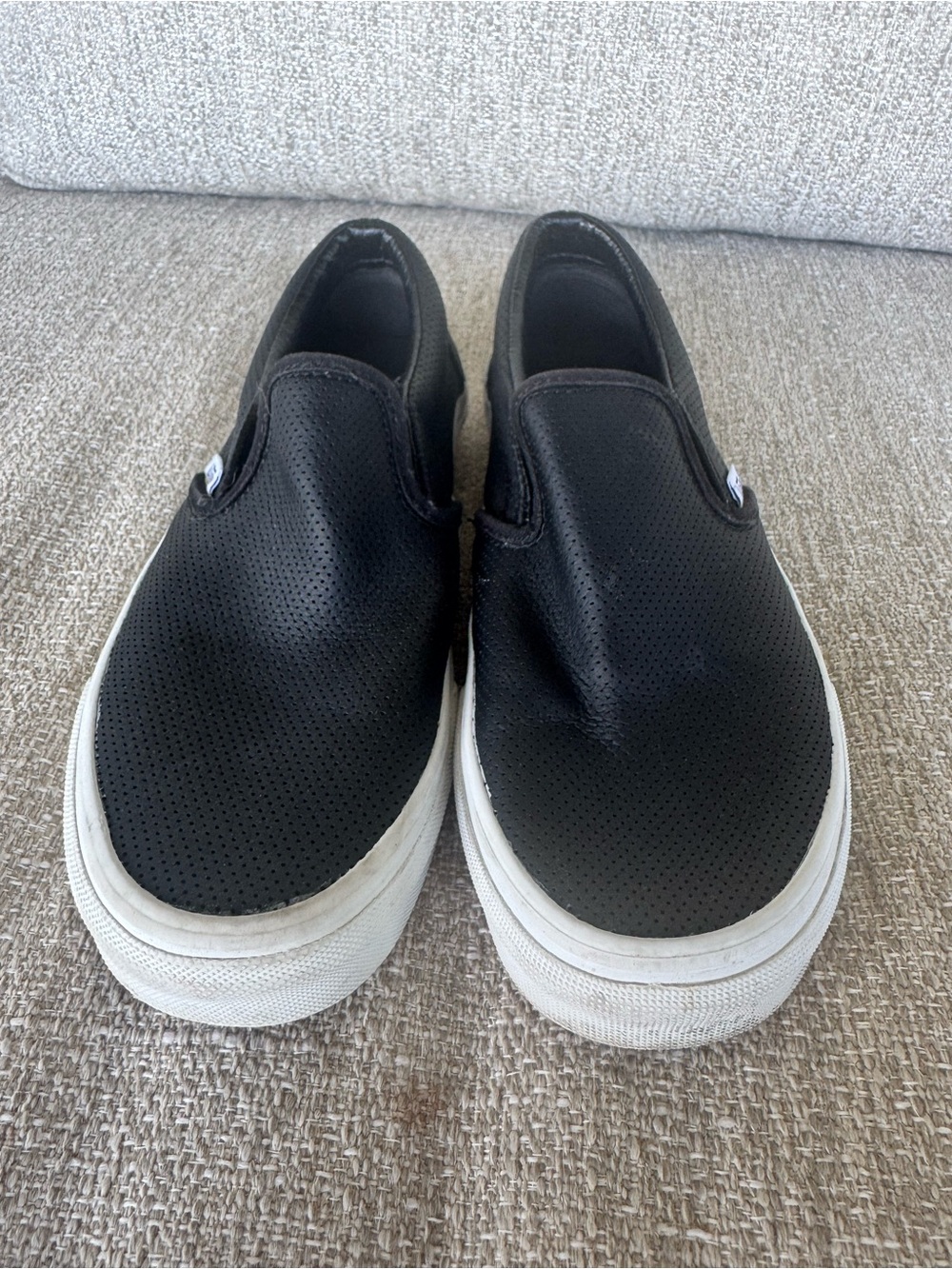 Black leather slip on vans. Women’s size 7. Men’s 5.5.